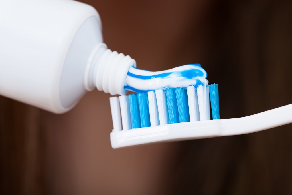 Adding Toothpaste On Brush